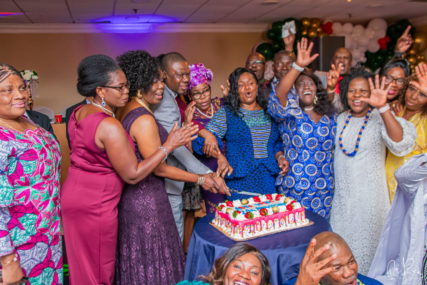 Cutting the anniversary cake together